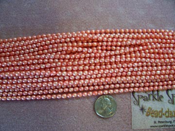 FW Pearl SALMON Rice Oval 5-6mm FW Pearl SALMON Rice Oval 5-6mm