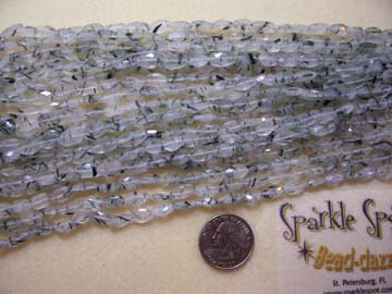 TOURMALATED QUARTZ Faceted Ovals 10mm TOURMALATED QUARTZ Faceted Ovals 10mm